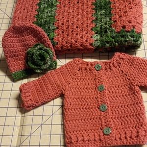 Handmade crocheted baby blanket, sweater and hat s